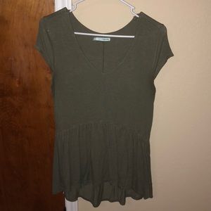 Deep green v neck peplum top.